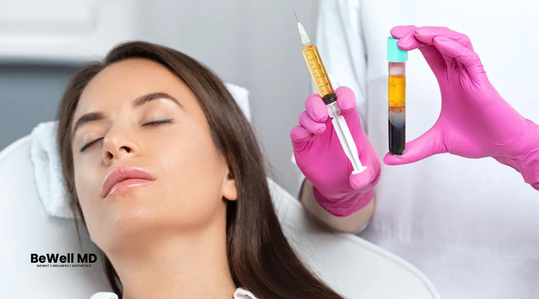 Female patient next to a provider holding a syringe and a vial